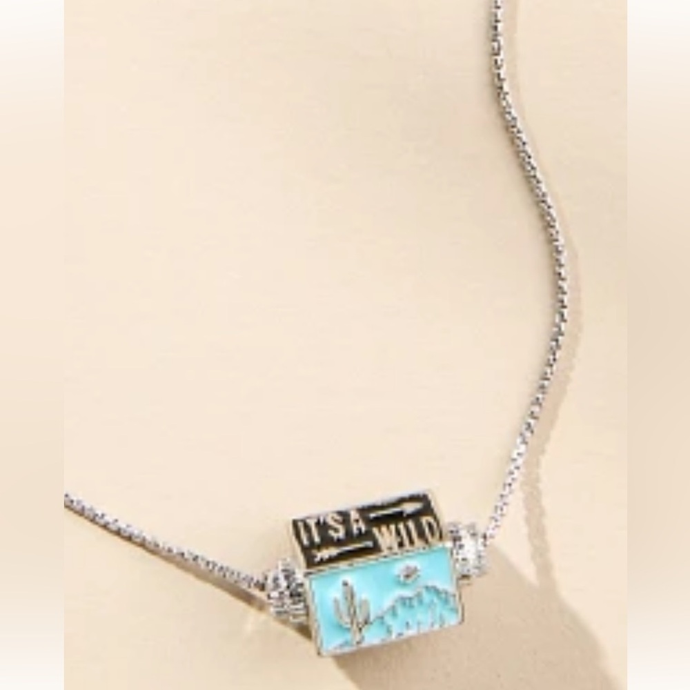 Anthro Spinner Necklace